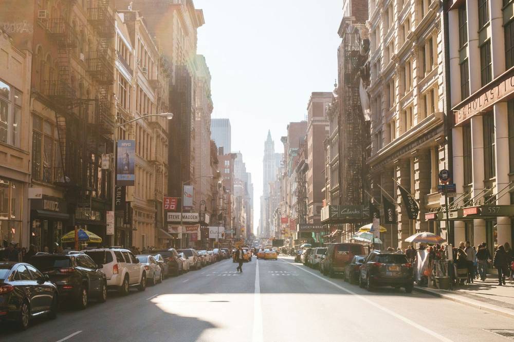 Cast-iron facades and street life in SoHo, New York City